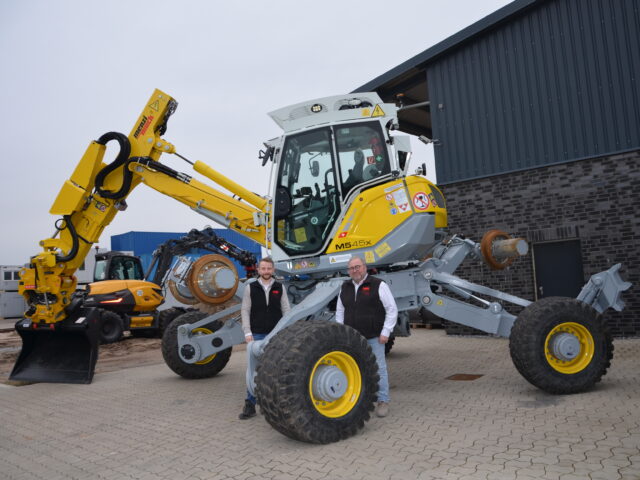 Schicke Container-Module und komplexe Baumaschinen